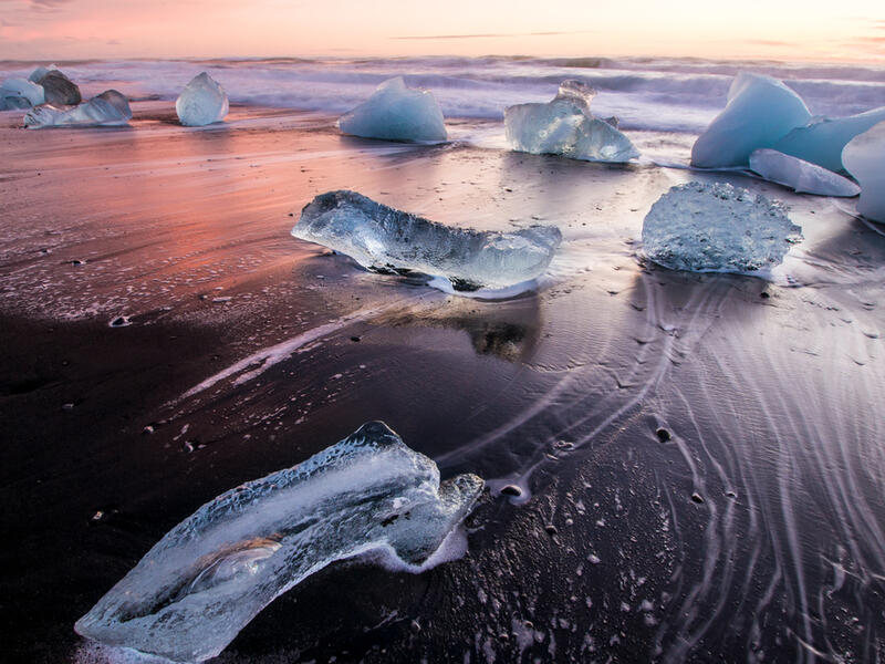 Ice on the black volcanic beach near Jokulsarlon glacier lagoon, winter Iceland (Shutterstock)