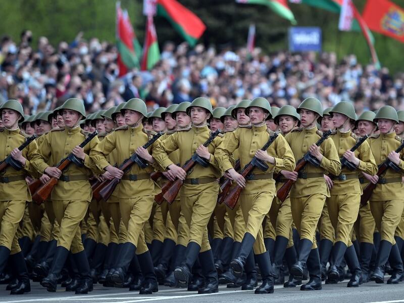 Belarus' servicemen wearing historical uniforms take part in a military parade to mark the 75th anniversary of the Soviet Union's victory over Nazi Germany in World War Two, in Minsk on May 9, 2020. Sergei GAPON / AFP