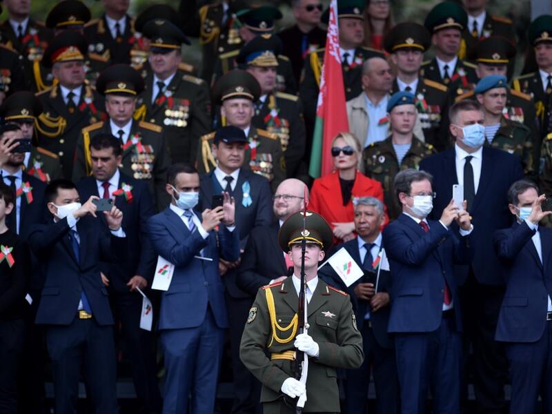 Guests attend a military parade to mark the 75th anniversary of the Soviet Union's victory over Nazi Germany in World War Two, in Minsk on May 9, 2020. Sergei GAPON / AFP