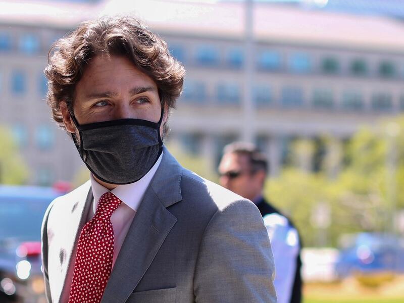 In this file photo Canadian Prime Minister Justin Trudeau arrives on Parliament Hill to attend a sitting of the Special Committee on the COVID-19 Pandemic, May 20, 2020 in Ottawa, Canada. Beijing's linking of its detention of two Canadians in China to the arrest of a Chinese executive in Vancouver shows it doesn't understand the meaning of an independent judiciary, Prime Minister Justin Trudeau said May 21, 2020. China detained former Canadian diplomat Michael Kovrig and businessman Michael Spavor in Decemb