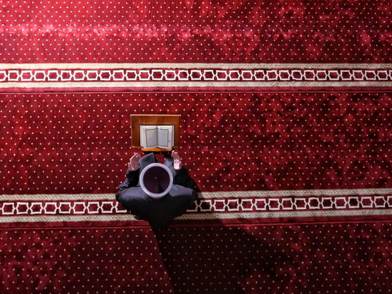 An imam attends Eid al-Fitr prayers, marking the end of the Muslim holy month of Ramadan at the Hadzi Hurem Mosque in the southern city of Novi Pazar on May 24, 2020. Muslims worldwide celebrate Eid Al-Fitr, end of daily fasting during holly month of Ramadan, as one of two most important holidays. Irfan LICINA / AFP