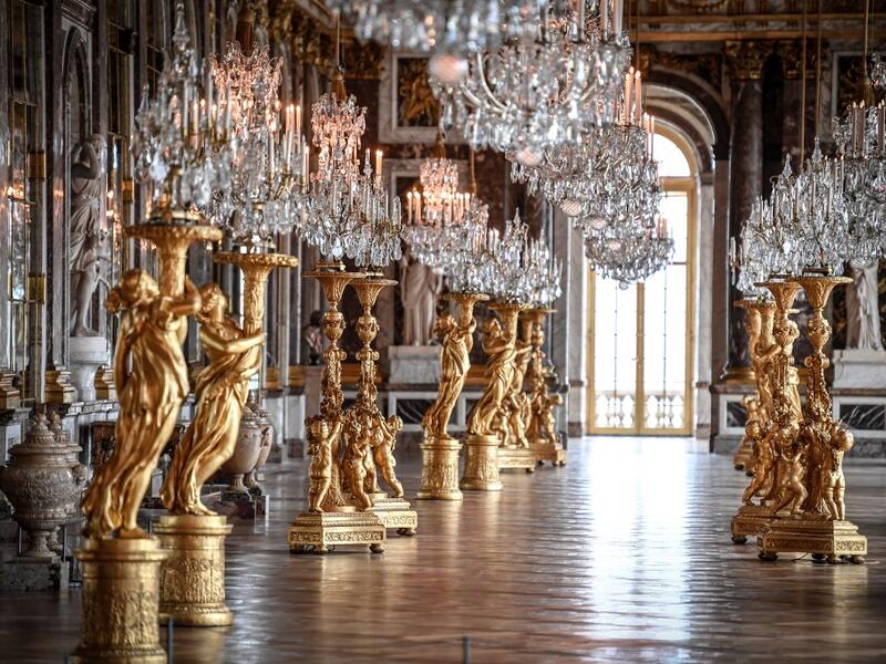 A picture taken in the Chateau de Versailles (Palace of Versailles) in Versailles near Paris, on June 5, 2020, shows the Galerie des Glaces (Hall of Mirrors) on the eve of it re-opening after 82 days of closure due to the novel coronavirus (COVID-19) outbreak. The Palace of Versailles -- France's big tourist attraction with nearly 10 million tourists a year - will open on June 6 with no US or Asia tourists who represent 30% of its visitors. STEPHANE DE SAKUTIN / AFP