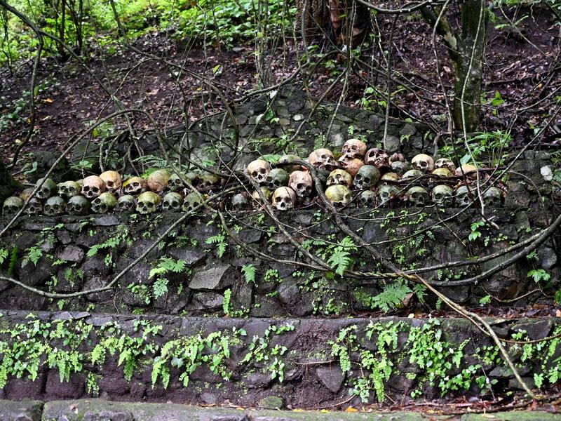 For centuries Bali's Trunyanese people have left their dead to decompose in the open air, the bodies placed in bamboo cages until only the skeletons remain -- a ritual they haven't given up -- even as the COVID-19 pandemic upends burial practices worldwide.  SONNY TUMBELAKA / AFP