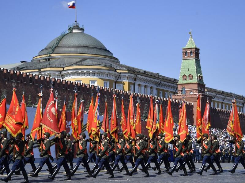Servicemen in historical uniforms march on Red Square during a military parade, which marks the 75th anniversary of the Soviet victory over Nazi Germany in World War Two, in Moscow on June 24, 2020. The parade, usually held on May 9, was postponed this year because of the coronavirus pandemic. Alexander NEMENOV / AFP