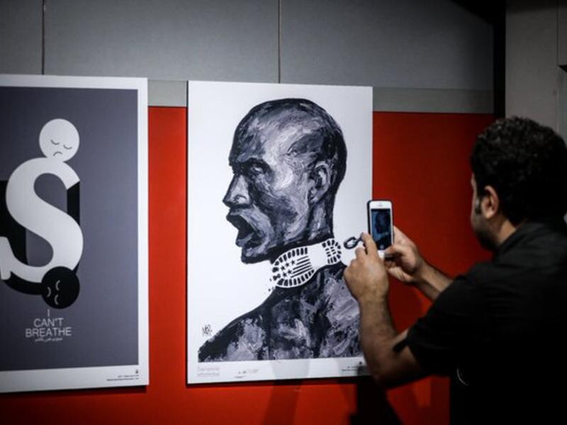 The international cartoon exhibition “I Can’t Breathe”,highlighting protests against racism in the U.S.,opened in the Aali Gallery of the Art Bureau in Tehran. (Twitter)