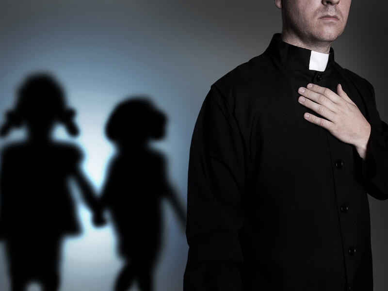 During Sunday's mass, protesters gathered outside on the cathedral steps. (Shutterstock/ File Photo)