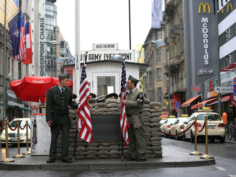 Checkpoint Charlie was the name given by the Western Allies to the best-known Berlin Wall crossing point between East Berlin and West Berlin during the Cold War.  B