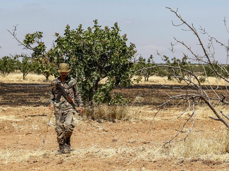 Maan, famed for its pistachio production, was controlled for years by jihadists and their rebel allies but it fell to the government at the start of the year following a months-long offensive. Although battles have died down, farmers in Hama are now grappling with landmines left behind by rebels and jihadists. LOUAI BESHARA / AFP