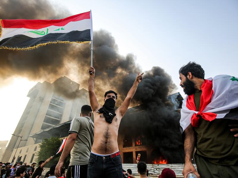 Since 1 October, thousands of people have descended on Baghdad’s Tahrir Square protesting the lack of jobs, poor working conditions and widespread corruption. (Ahmad Al-Rubaye/ AFP)