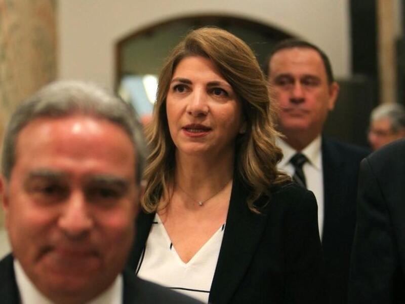 Lebanese Justice Minister Marie Claude Najm, center, cited the catastrophic Beirut explosion as her reason for resigning. (AFP file photo)