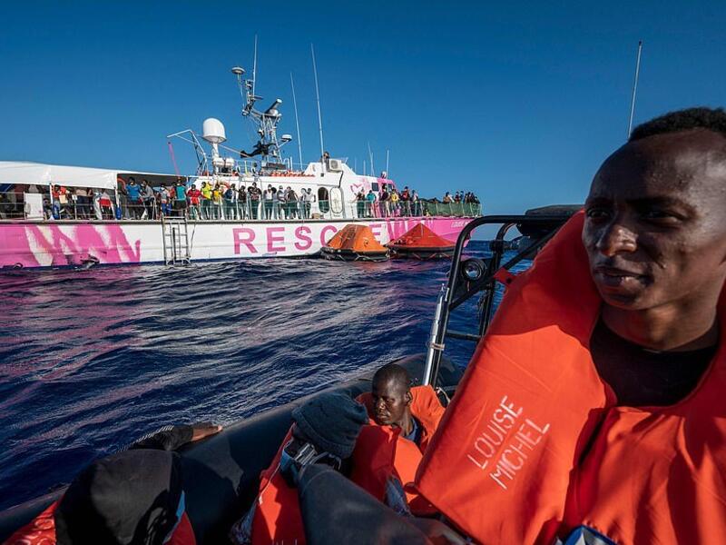 The 100ft former French navy vessel, named after a female anarchist, had been almost double its maximum safe capacity of 120 and was said to be 'losing its balance' (AFP)