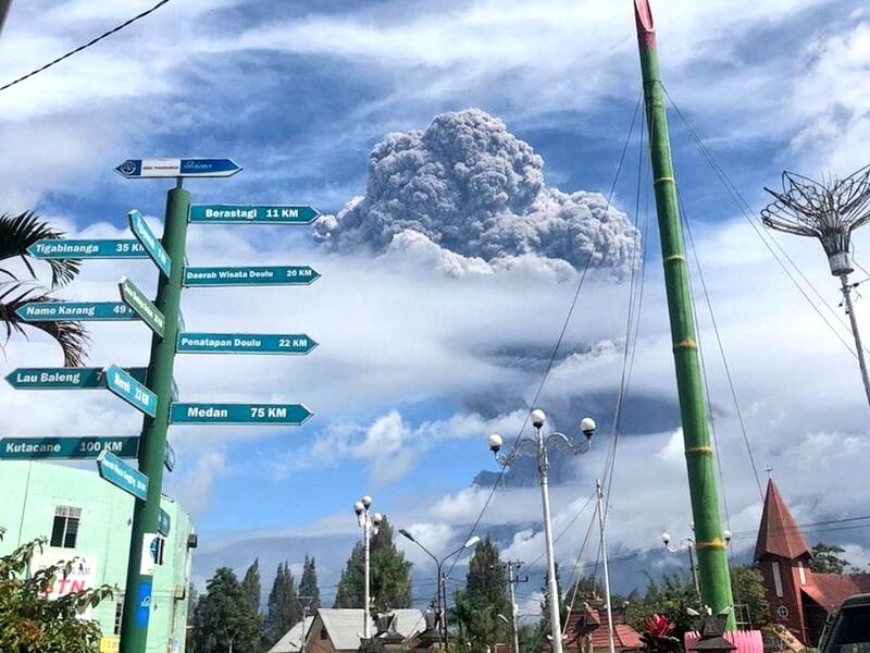 Rumbling Mount Sinabung on Indonesia’s Sumatra island sends a column of volcanic materials as high as 16,400 feet into the sky (Twitter)