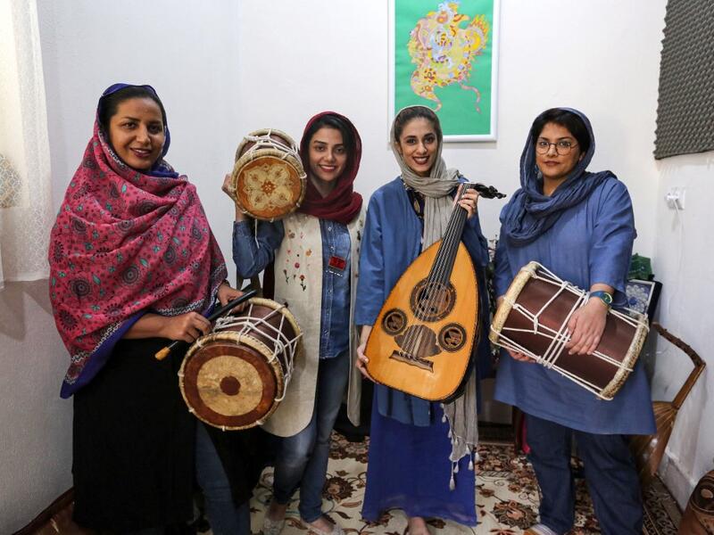 The all-women band "Dingo" -- which in the local dialect refers to the first wobbly steps of infants as they learn to walk -- was formed in late 2016, but their performance in April 2019 was only the second time that they had been able to play to a mixed audience at the state-organised "Persian Gulf music" festival in Bandar Abbas. ATTA KENARE / AFP