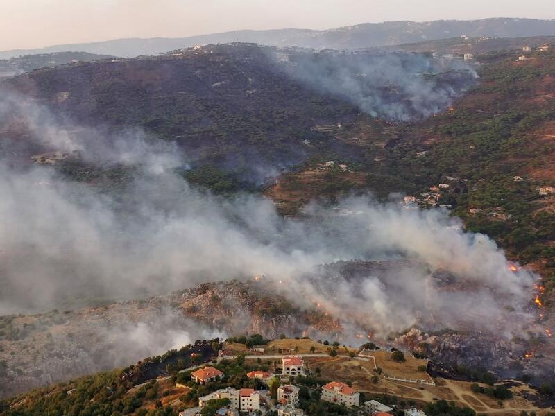 An aerial picture shows smoke billowing from a forest fire in Lebanon's Ras El Metn area, on October 10, 2020. AFP