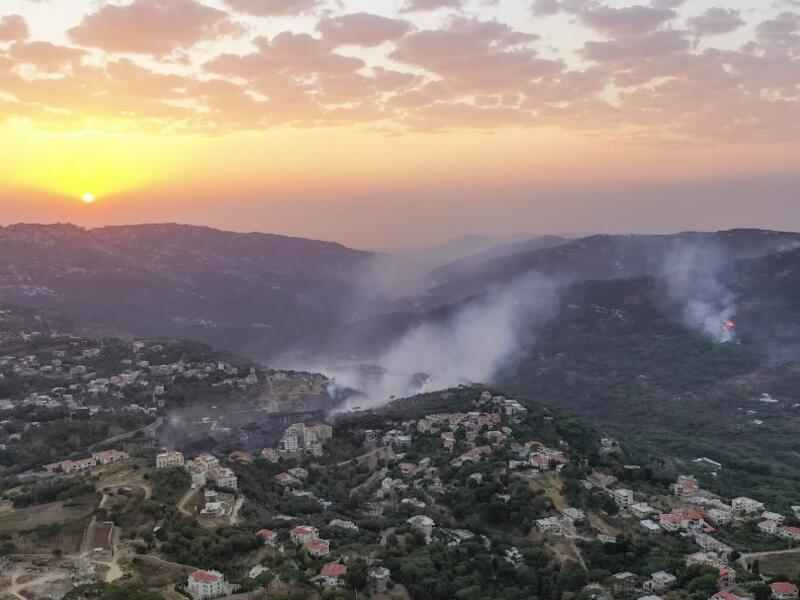 An aerial picture shows smoke billowing from a forest fire in Lebanon's Ras El Metn area, on October 10, 2020. AFP