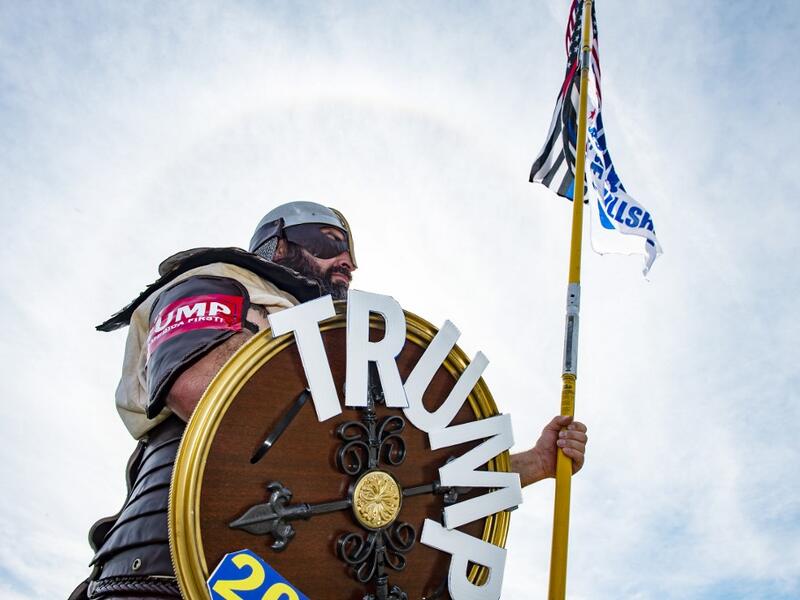 A contestant dressed as a viking version of President Trump poses for a portrait during a Trump campaign rally named "Trumptoberfest" at Rocky Point Park in Warwick, Rhode Island on October 11, 2020. Many supporters dressed in political campaign clothing and waved flags while others dressed in festive costumes to take part in a political costume contest. Joseph Prezioso / AFP