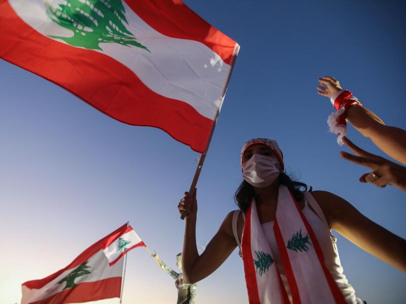 Hundreds marched in Lebanon's capital to mark the first anniversary of a non-sectarian protest movement that has rocked the political elite but has yet to achieve its goal of sweeping reform. ANWAR AMRO / AFP