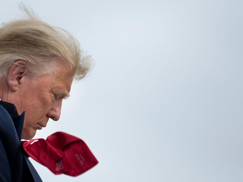 The US presidential campaign enters its final day Monday with a last-minute scramble for votes by Donald Trump and Joe Biden, drawing to a close an extraordinary race that has put a pandemic-stricken country on edge. Brendan Smialowski / AFP
