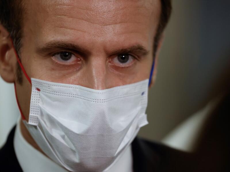 French President Emmanuel Macron listens during a visit to the 2020 Phoneton, an annual fundraising operation organised by the Hayastan All-Armenian Fund's French affiliate (Fonds Armenien de France) for the development of Armenia and Artsakh, on November 21, 2020 in Paris. Ludovic MARIN / POOL / AFP