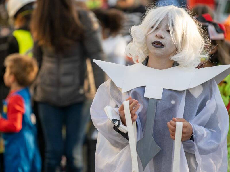 A child in costume for Halloween in Woodlawn Heights on October 31, 2020 in New York City. The CDC shared on their website alternative ways to still celebrate the holiday while being safe. David Dee Delgado/Getty Images/AFP