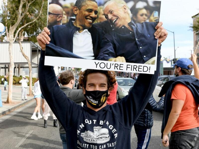 people have begun to congregate in cities across America after news outlets announced Joe Biden had reached the number of electoral votes needed to win the election. Kevin Winter/Getty Images/AFP