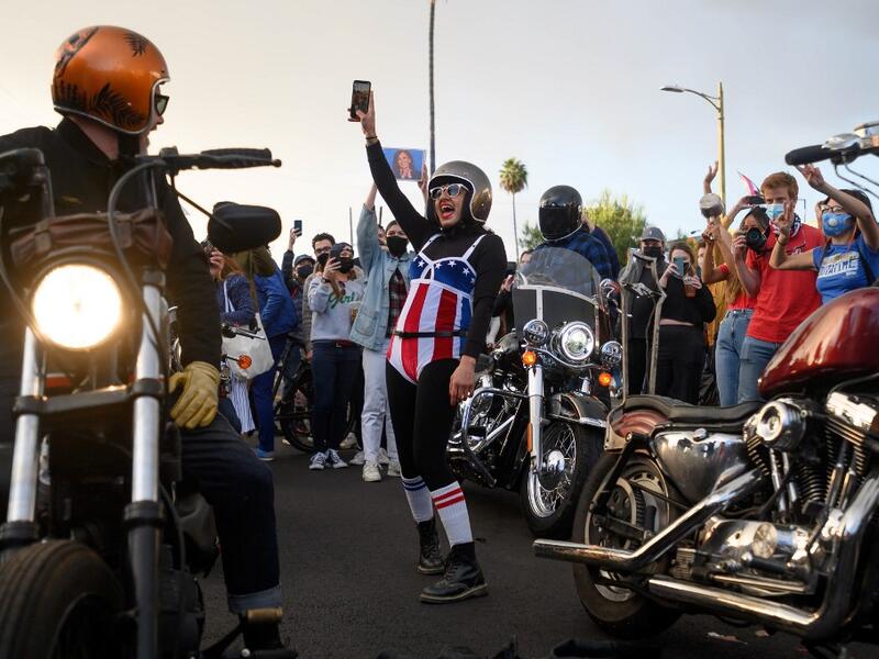 People celebrate the results of the 2020 Presidential election along West Hollywood on November 7, 2020 in Los Angeles, California. Emma McIntyre / GETTY IMAGES NORTH AMERICA / Getty Images via AFP