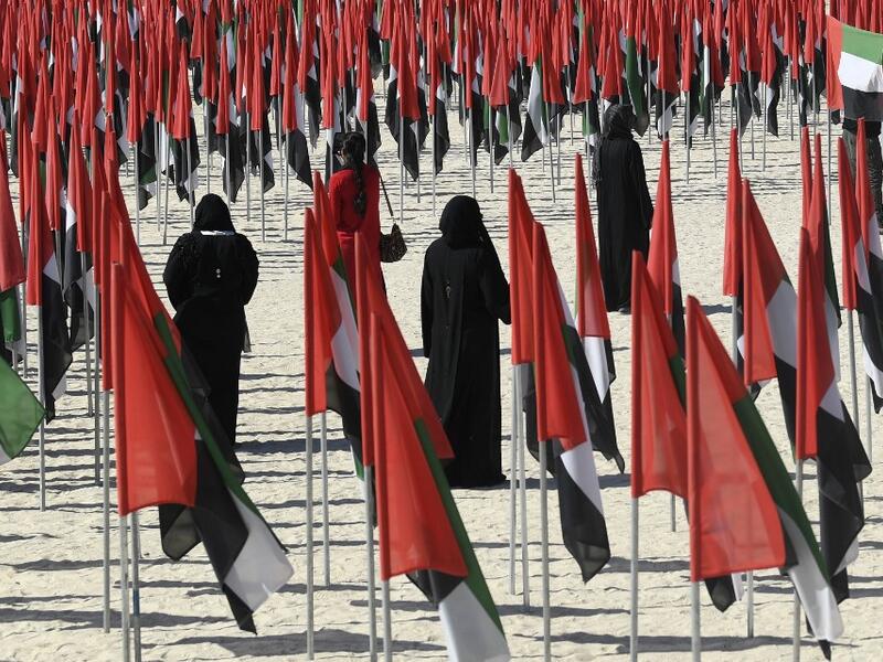 Emiratis attend celebrations of UAE's national day on December 2, 2020. Karim SAHIB / AFP