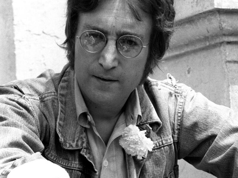 In this file photo taken on May 17, 1971 music legend John Lennon poses for photographers in Cannes 17 May 1971 where he presented his movies 'Apotheosis' and 'The Flu'. John Lennon's career was cut short 40 years ago, on December 8, 1980, when he was shot dead in New York. AFP