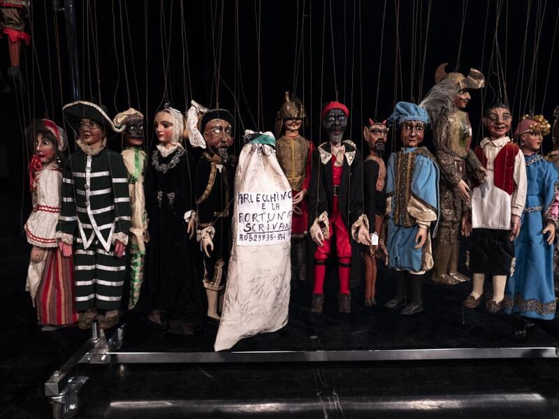Puppets of Grilli's family collection are pictured on the stage at the " Alfa Theatre" in Turin, on November 30, 2020. The Grilli family has a collection of more than 20,000 objects from around the world, everything from theatres, marionettes and glove puppets to shadow figures and silhouettes. A long-time dream of Grilli and his wife Mariarosa, 78, the museum is due to open in 2023 in Turin, financed both privately and publicly with the help of different institutions.  Marco Bertorello / AFP
