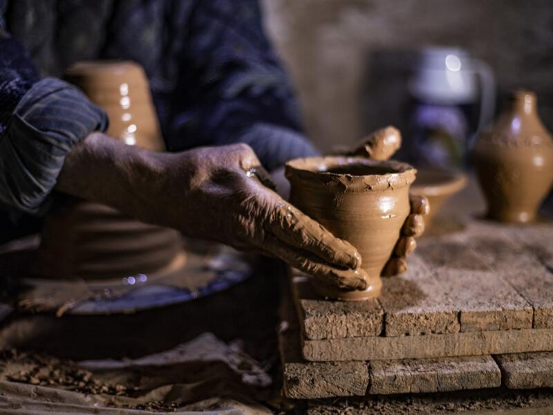 Petros was only a teenager when he had to take over for his sick father and become the main potter of the family. He has since become a master of the craft, and is keen to pass his skills on.  Delil SOULEIMAN / AFP