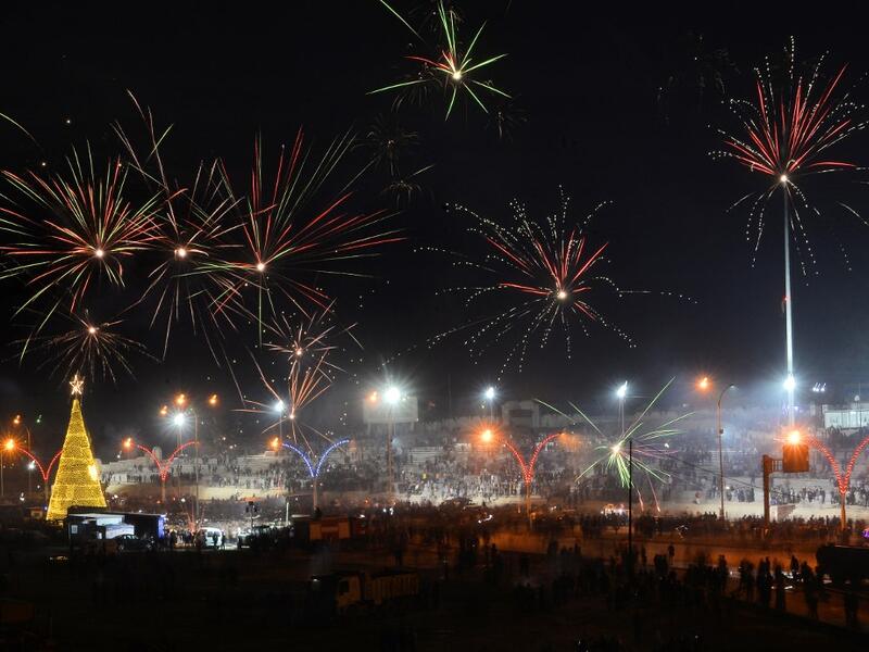 Iraqis celebrate New Year's Eve in the northern city Mosul on December 31, 2020. Zaid AL-OBEIDI / AFP