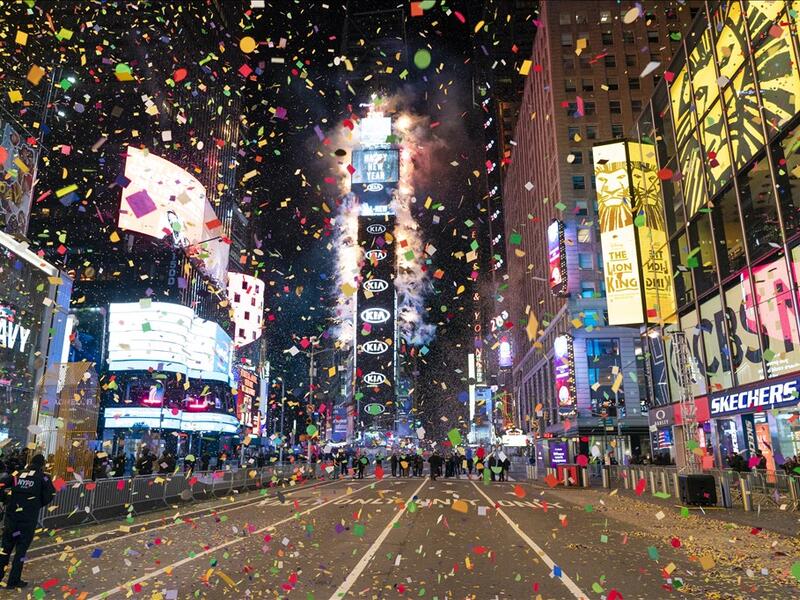 Confetti are flying in the air on a mostly empty Times Square for New Year’s Eve in New York City on January 1, 2021. Due to the Coronavirus outbreak Times Square is closed to all but a few revelers. COREY SIPKIN / AFP