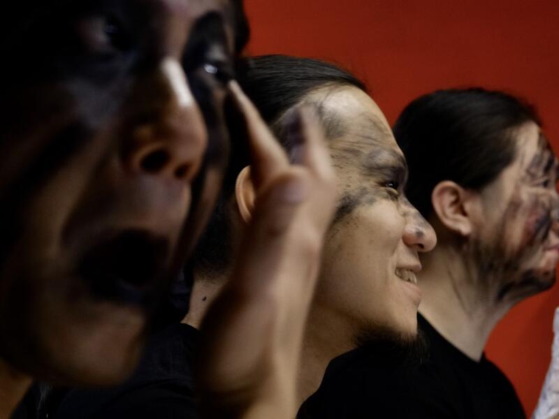 This picture taken on December 3, 2020 shows members of Taiwanese death metal band 'Dharma' putting on makeup during a rehearsal in Taipei. Sam Yeh / AFP