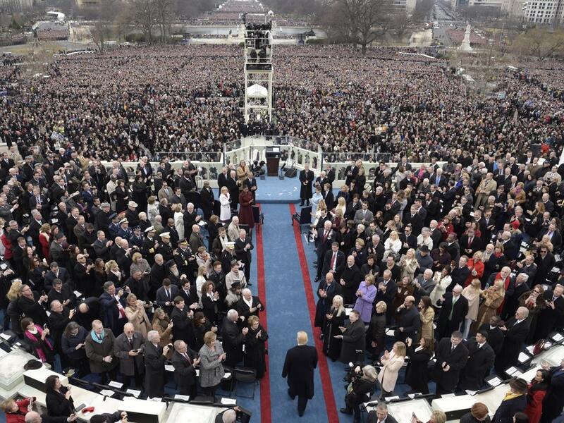 AFP presents a retrospective photo package of 60 pictures marking the 4-year presidency of President Trump. US President elect Donald Trump (C) arrives for the swearing-in ceremony on in front of the Capitol in Washington on January 20, 2017. Brendan SMIALOWSKI / AFP