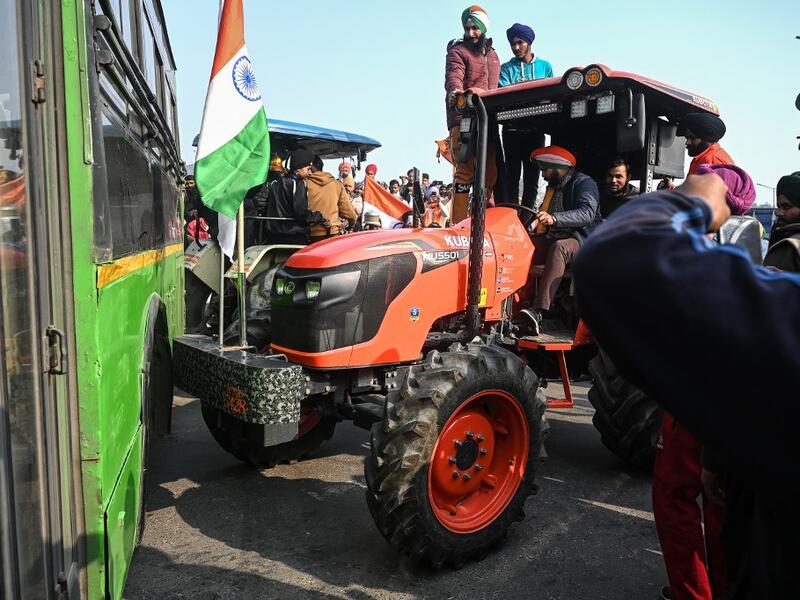 Farmers take part in a rally as they continue to protest against the central government's recent agricultural reforms, in New Delhi on January 26, 2021. Sajjad HUSSAIN / AFP