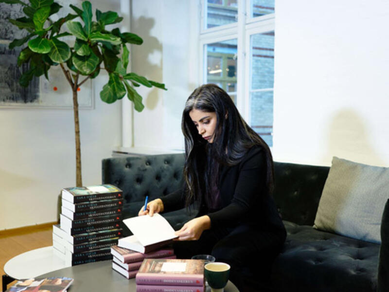 Born amid the horrors of war in Iraqi Kurdistan, Danish author Sara Omar now raises her voice to denounce violence inflicted on women. (AFP)