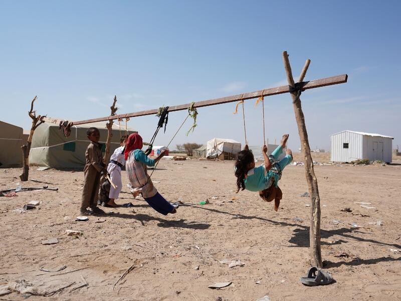 Yemeni children play at the Jaw al-Naseem camp for internally displaced people on the outskirts of the northern city of Marib, on February 18, 2021 in the Saudi-backed Yemeni government's last northern bastion. Until early last year, life in Marib city was relatively peaceful despite the Yemen's civil war that erupted in 2014. The United Nations warned last week of a potential humanitarian disaster if the fight for Marib continues, saying it has put "millions of civilians at risk". More than 3.3 million hav