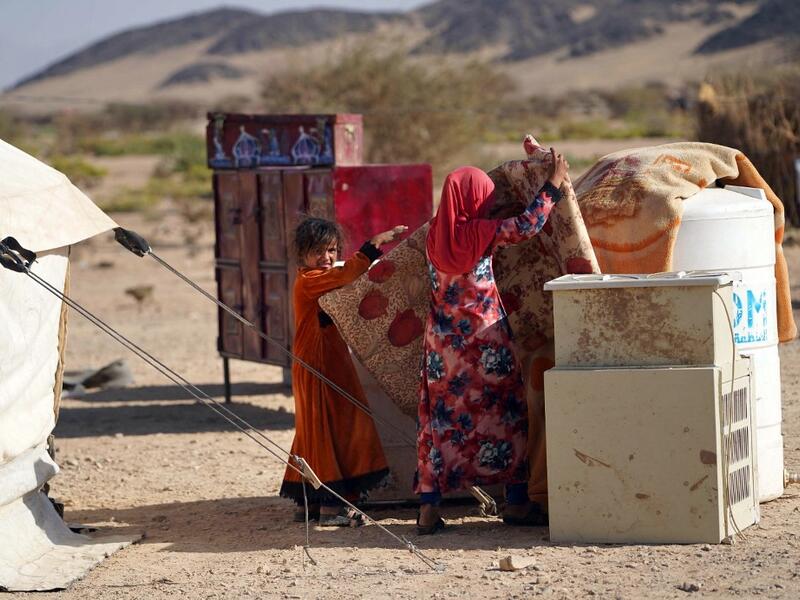 Yemeni children are pictured at the Jaw al-Naseem camp for internally displaced people on the outskirts of the northern city of Marib, on February 18, 2021 in the Saudi-backed Yemeni government's last northern bastion. Until early last year, life in Marib city was relatively peaceful despite the Yemen's civil war that erupted in 2014. The United Nations warned last week of a potential humanitarian disaster if the fight for Marib continues, saying it has put "millions of civilians at risk". More than 3.3 mil