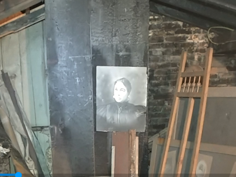 A New York state attorney who bought a building to expand his practice discovered a hidden attic that contained photographs and photography-related items. (Video Screenshot)