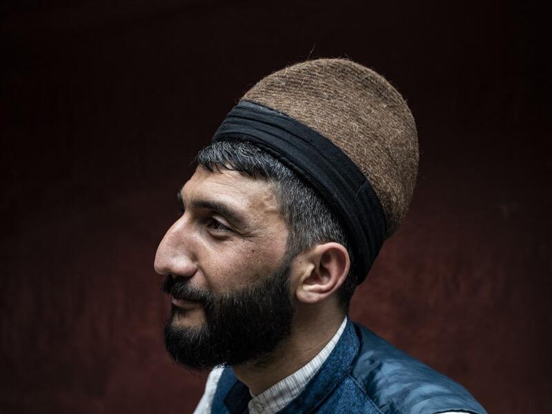 A Syrian Kurdish man in traditional attire 