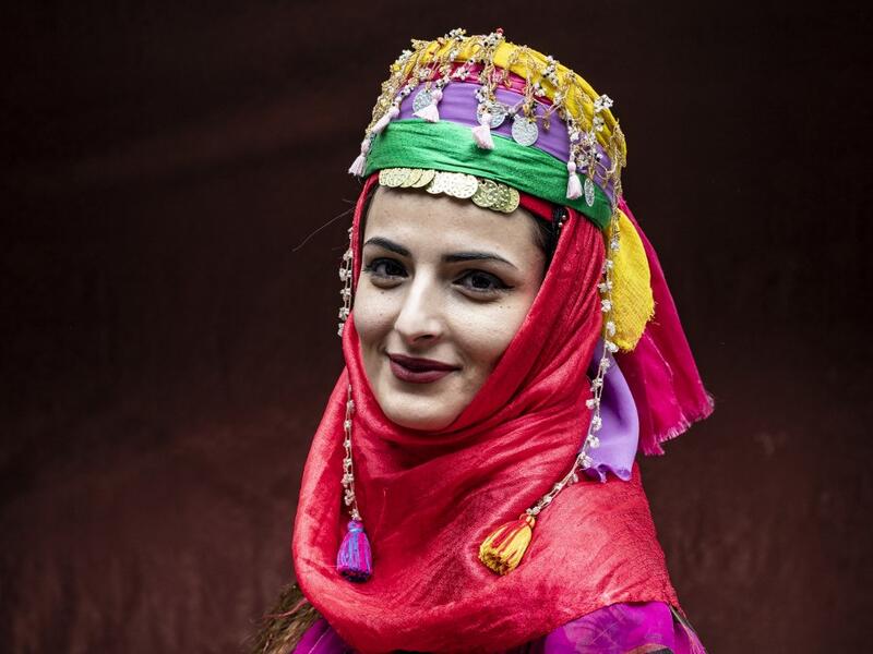A Syrian Kurdish woman in traditional attire