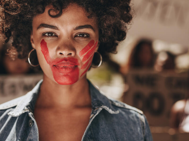 A female activist in red 