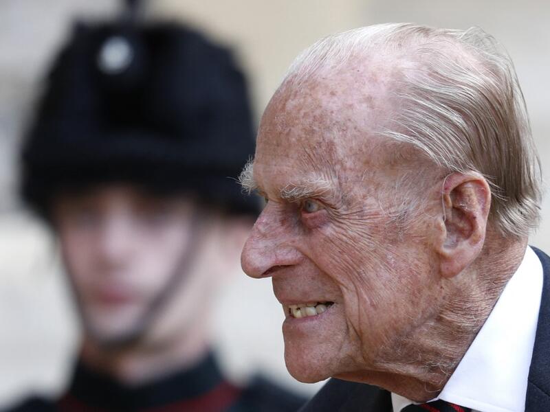  July 22, 2020 Britain's Prince Philip (C), Duke of Edinburgh passes a bugler during the transfer of the Colonel-in-Chief of The Rifles 