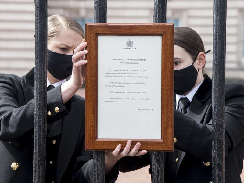An official notice announcing the death of Britain's Prince Philip, Duke of Edinburgh is placed on the gates of Buckingham Palace 