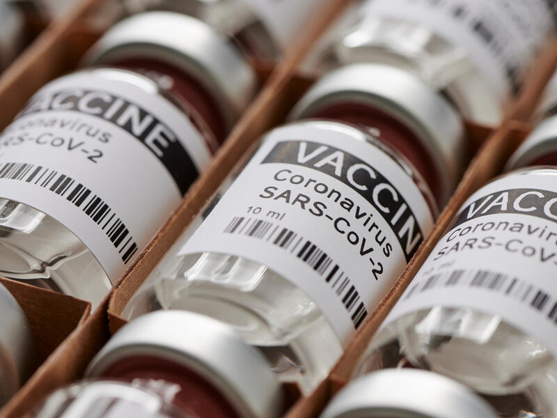 Some ampoules with ncov-2019 vaccine in a box