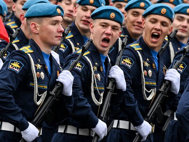 Russian servicemen shout during the Victory Day military parade at Red Square in Moscow on May 9, 2021. Russia celebrates the 76th anniversary of the victory over Nazi Germany during World War II. 