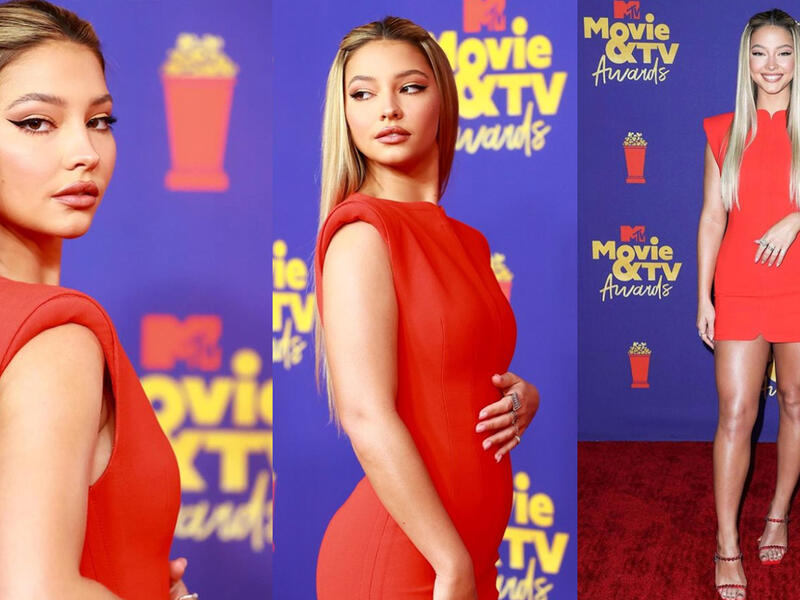  Madelyn Cline Hit the red carpet in a red Versace minidress with sculpted shoulders and Swarovski crystal encrusted sandals 