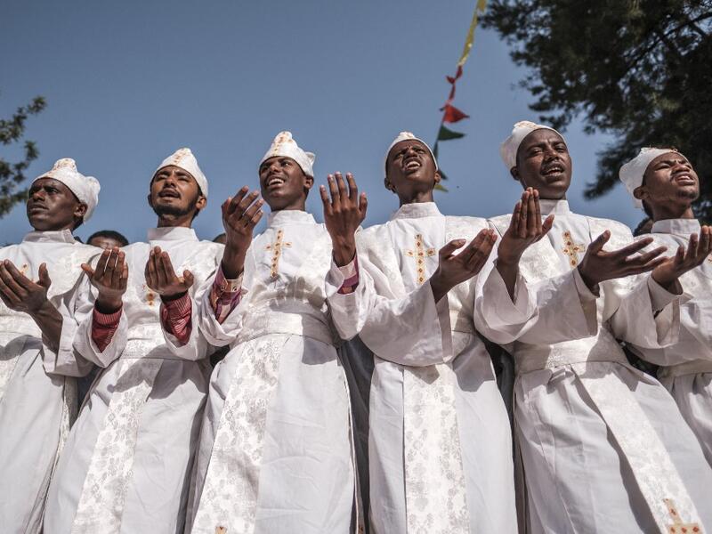 Ethiopian Orthodox devotees chant during the religious celebration of Saint Michael in the city of Bahir Dar, Ethiopia