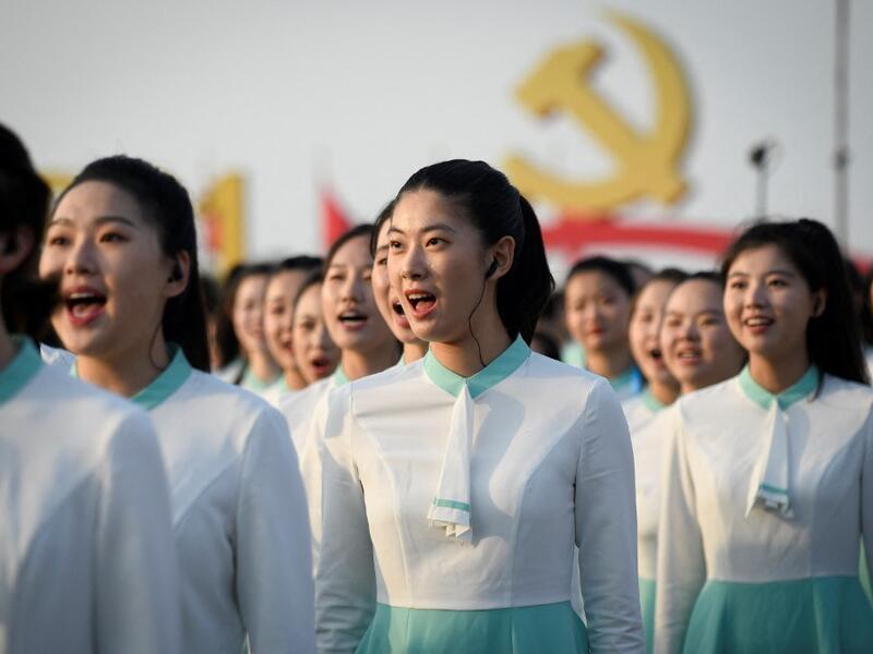 Members of Chorus sing during a rehearsal before the celebrations marking the 100th anniversary of the founding of the Communist Party of China in Beijing 