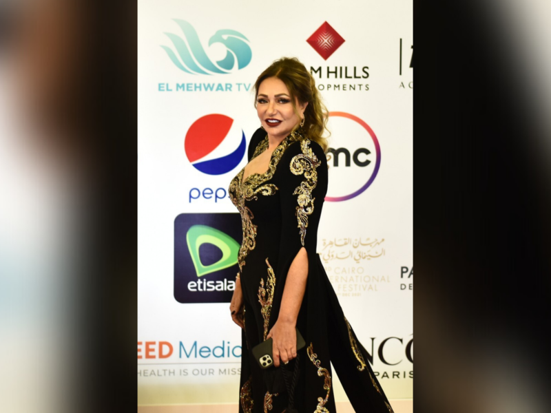 Egyptian actress Laila Elwi poses on the red carpet during the opening of the 43rd edition of the Cairo International Film Festival (CIFF) at the Cairo Opera House in the Egyptian capital on November 26, 2021. (Photo by Sayed HASAN / AFP)